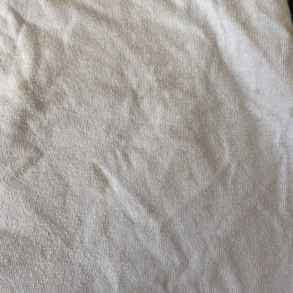 Small stain barley visible on the bottom of the shirt, see photo 5 for reference - Picture 5 of 5